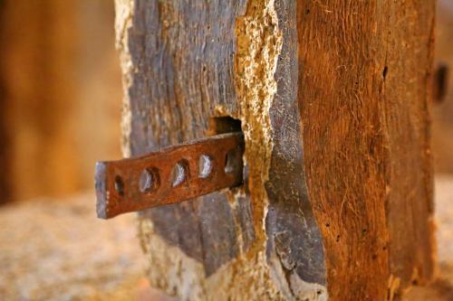 a piece of wood with honey coming out of it at Curral de l Tiu Pino in Sendim