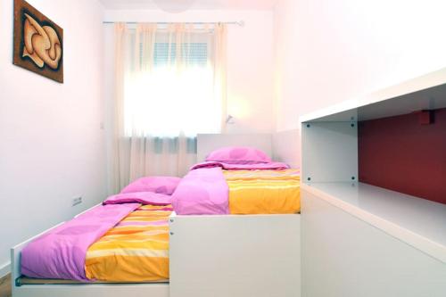 Postel nebo postele na pokoji v ubytování Apartment Trnje