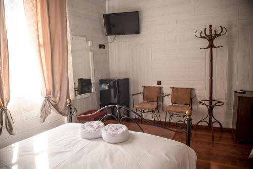 Príslušenstvo na prípravu kávy alebo čaju v ubytovaní 1920s Rooms