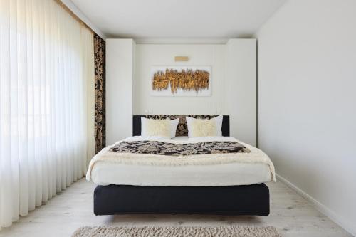 Letto o letti in una camera di Aparthotel Voglergasse