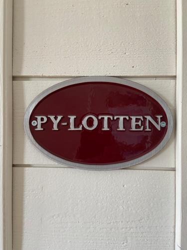 a sign on a wall that says pay lottery at Bashults Gård in Jönköping