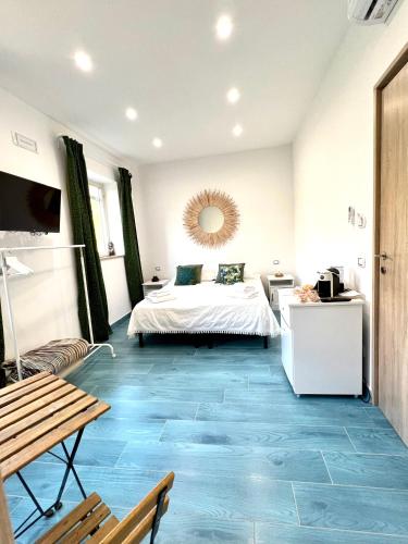 Кровать или кровати в номере Casa OIKIA Anacapri