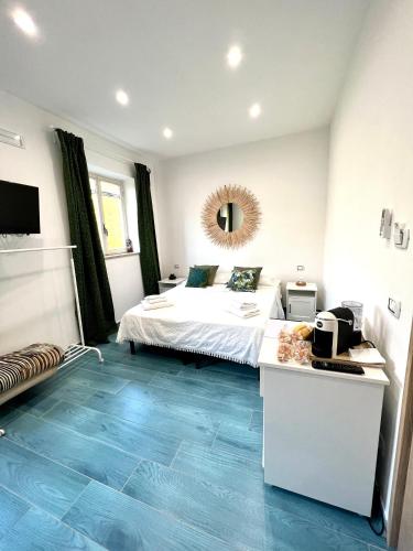 Кровать или кровати в номере Casa OIKIA Anacapri