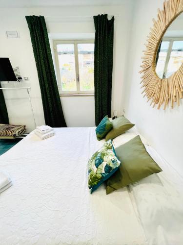 Кровать или кровати в номере Casa OIKIA Anacapri