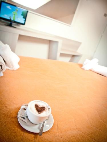 Ein Bett oder Betten in einem Zimmer der Unterkunft Riviera Mare Beach Life Hotel