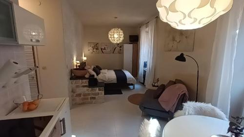 Leut Apartment tesisinde bir odada yatak veya yataklar