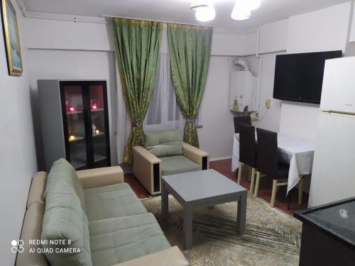 a living room with a couch and a table at Üsküdar halk caddesi in Istanbul