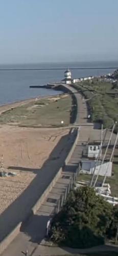 an aerial view of a road next to the ocean at Seaview B&B in Harwich