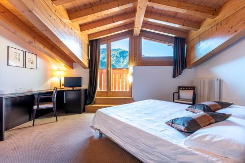 Posteľ alebo postele v izbe v ubytovaní Hotel La Perla