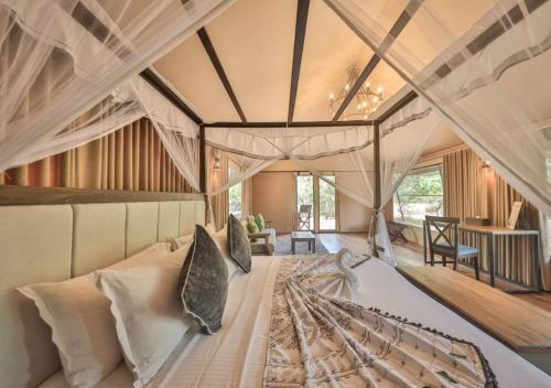 Cama o camas de una habitación en Tribe Yala - Luxury Camping