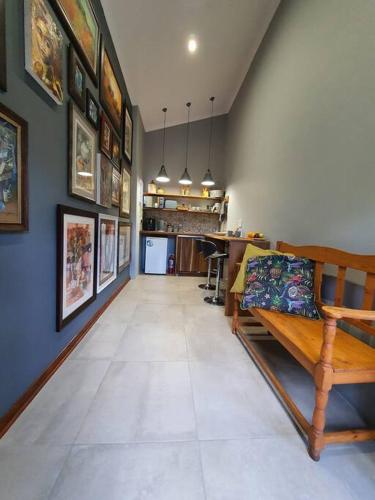 a living room with a bench and a table at Bendor Garden Flat in Polokwane