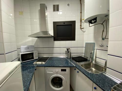 A kitchen or kitchenette at Premium Center Alameda