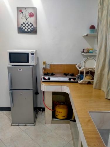 Cuisine ou kitchenette dans l'établissement BabaJay Family Home