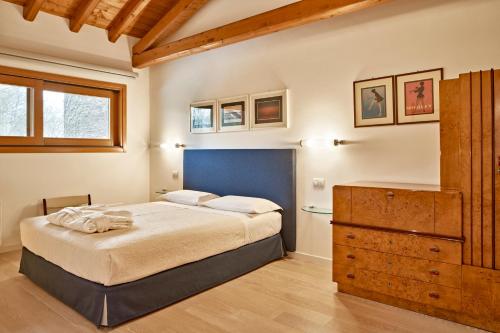 Ένα ή περισσότερα κρεβάτια σε δωμάτιο στο Al Canton Agriturismo di Design