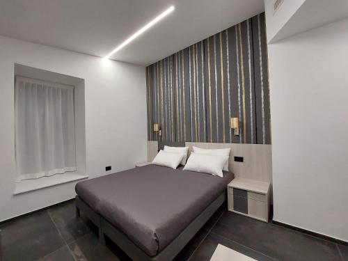 Ein Bett oder Betten in einem Zimmer der Unterkunft Incantos charme B&B