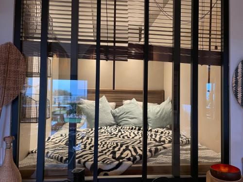 Llit o llits en una habitació de La Rose Rouge