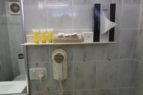 Kylpyhuone majoituspaikassa Citigate Motel Newcastle