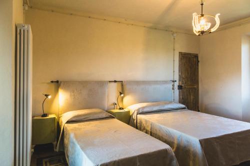 Katil atau katil-katil dalam bilik di Casa San Michele - Affittacamere Panoramico con Spa