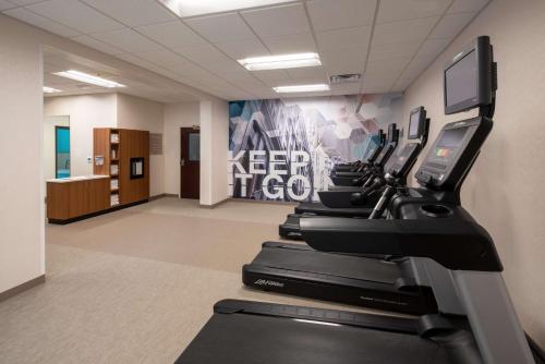 a row of treadmills in a gym at Sonesta Select Nashville Airport Suites in Nashville