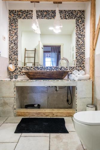 a bathroom with a sink and a mirror at Country House Trata in Kranjska Gora