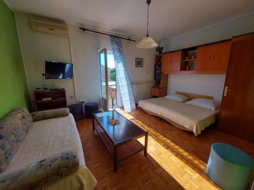 Postel nebo postele na pokoji v ubytování Apartments Fam Tomasic