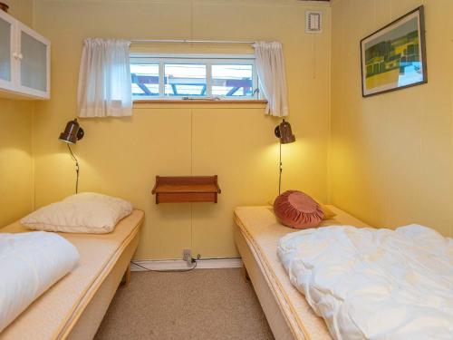 Ένα ή περισσότερα κρεβάτια σε δωμάτιο στο Holiday home Grenaa VI