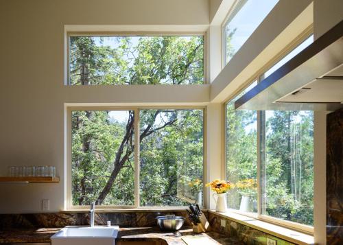 a large window in a kitchen with a sink at Alpenglow 1 in Yosemite West