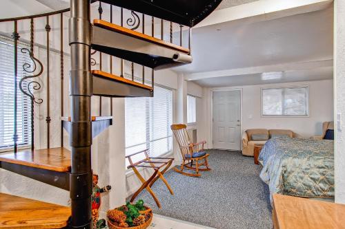 a room with a room with a bed and a fireplace at Chateau Royal East in Yosemite West