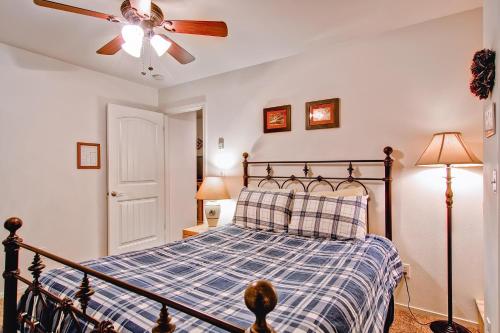a bedroom with a bed and a ceiling fan at Bears Den & Little Bear in Yosemite West