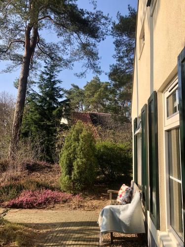 Κήπος έξω από το Cottage Hazenhorst - paradijs aan het bos