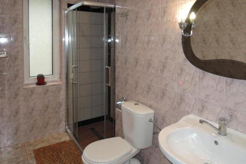 Kúpeľňa v ubytovaní holiday home, Miedzyzdroje