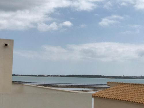 a view of the ocean from the balcony of a building at Ponent Formentera in La Savina