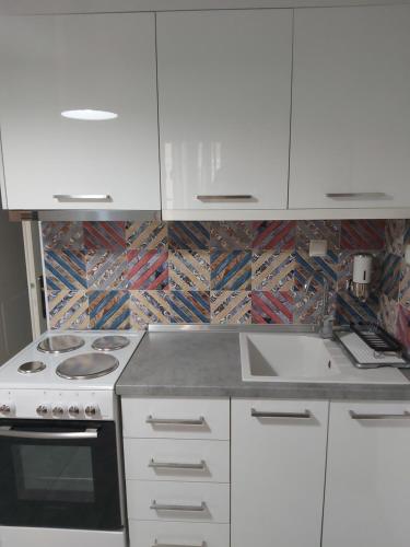 Kuchyň nebo kuchyňský kout v ubytování Lux apartment downtown