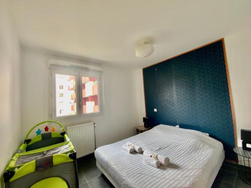 GROOMI Le Port Marianne- Appartement cosy avec 1 chambre 객실 침대