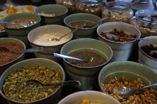 a table full of bowls of different types of food at Best Western Hotel Corallen in Oskarshamn