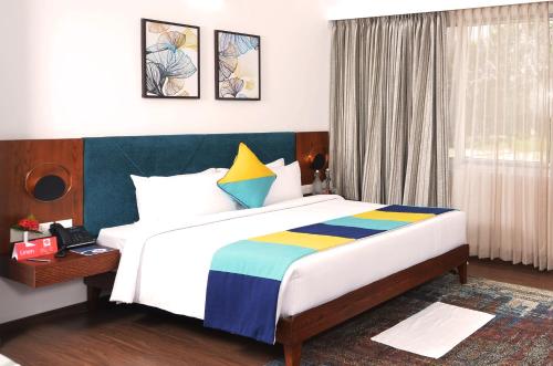 Postel nebo postele na pokoji v ubytování Spree Resort At Century Wintersun