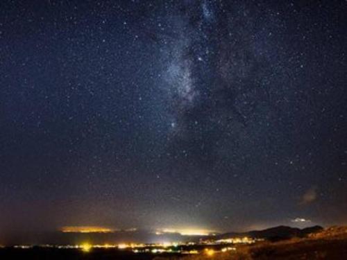a starry night with the milky way in the sky at Villa Papaz - cosy spacious sea view pool in Conil