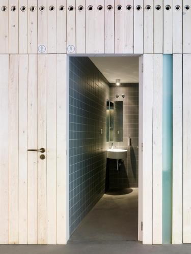 a bathroom with a sink and a mirror at Moure Hotel in Santiago de Compostela