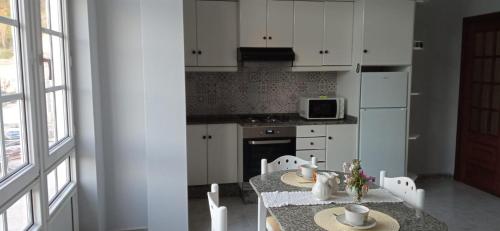 Kuchyň nebo kuchyňský kout v ubytování Apartamento Chamela