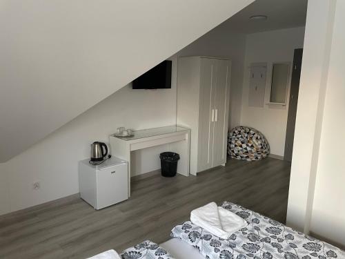 Katil atau katil-katil dalam bilik di Apartamenty i Pokoje DIMAN