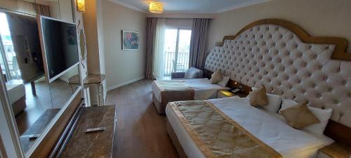 TV o dispositivi per l'intrattenimento presso Oz Hotels Side Premium