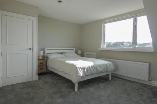 Ένα ή περισσότερα κρεβάτια σε δωμάτιο στο Ocean View, Portstewart