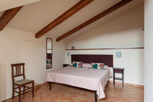Ένα ή περισσότερα κρεβάτια σε δωμάτιο στο Bed and Breakfast Donna Olimpia