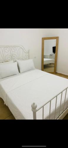 En eller flere senge i et værelse på שלוות הגולן