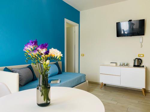 Televisyen dan/atau pusat hiburan di La Tortorella Room & Apartment