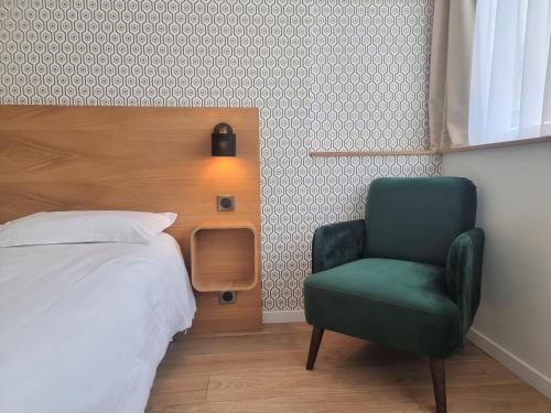 Postel nebo postele na pokoji v ubytování Oskar Hotel