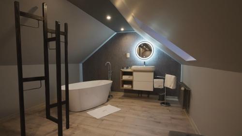 Koupelna v ubytování Les Suites M