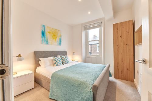 Postel nebo postele na pokoji v ubytování Herrington boutique apartment
