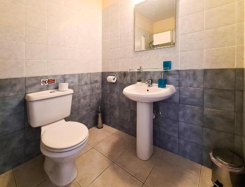 Koupelna v ubytování Serena Townhouse