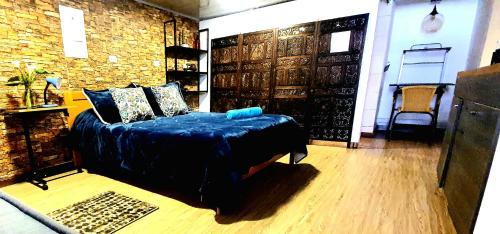 Łóżko lub łóżka w pokoju w obiekcie Aparta estudio Xenia